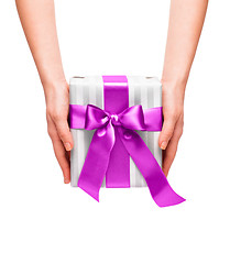 Image showing male holding gift box with a bow