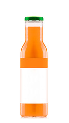 Image showing Orange juice in glass bottle