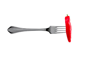 Image showing hot chilli pepper on fork isolated