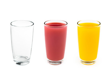 Image showing glass empty with two glasses juice