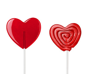Image showing two red heart-lollipops isolated