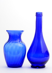 Image showing Blue vase and oil bottle