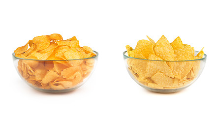 Image showing two bowls of potato and nacho chips isolated on white background