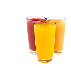 Image showing Tropical juices in glasses isolated on white