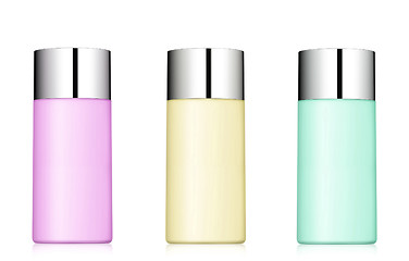 Image showing close up of a three bottles on white background