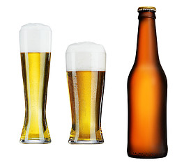 Image showing Glass of beer with glasses isolated on white