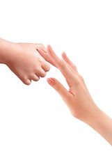 Image showing Baby hand holding mother finger