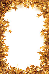 Image showing Christmas Gold Tinsel as a border isolated