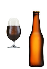 Image showing bottle  glass of brown beer on white background