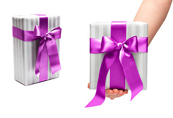 Image showing male holding gift box with a bow