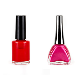 Image showing red with pink nails polish bottles