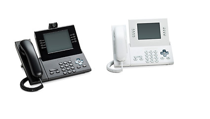 Image showing Two Office IP telephones set with LCD display isolated on white