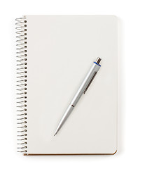 Image showing Note book with pen isolated on white