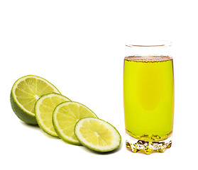 Image showing Lime juice in glass with lime slices