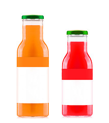 Image showing Orange and strawberry juices in glass bottles