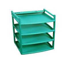 Image showing Green plastic shelves isolated on white