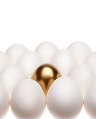Image showing one gold egg lays among common white eggs