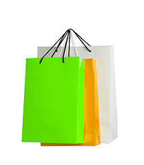 Image showing Assorted colored shopping bags on white