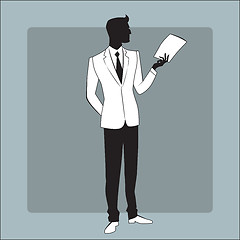 Image showing Businessman in modern clothes reads the report