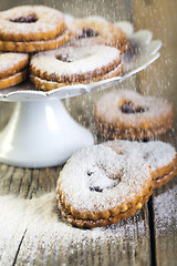 Image showing Linzer cookies sprinkled with powdered sugar.