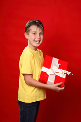 Image showing Child with present ribbon bow