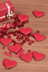 Image showing Red hearts confetti in box valentine love concept