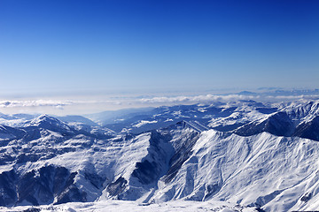 Image showing Winter snowy mountains in sun day