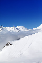 Image showing Winter snowy mountains at sunshine day