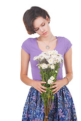 Image showing young cute woman with flowers