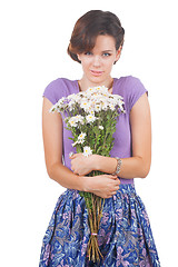 Image showing young cute woman with flowers