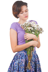 Image showing young cute woman with flowers