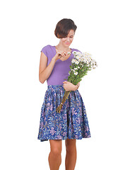 Image showing young cute woman with flowers