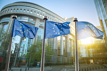 Image showing European union flag against parliament in Brussels