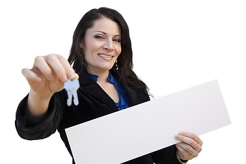 Image showing Hispanic Woman Holding Blank Sign and Keys On White