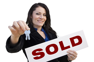 Image showing Hispanic Woman Holding Sold Sign and Keys On White