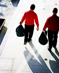 Image showing Taking out the garbage