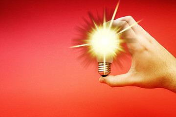 Image showing Background with lit lightbulb