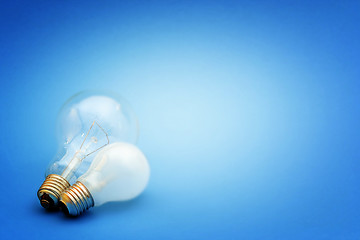 Image showing Background with lit lightbulb