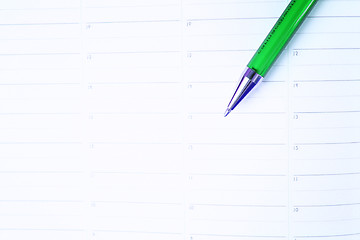 Image showing Color pencil and agenda