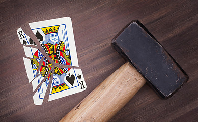 Image showing Hammer with a broken card, king of spades