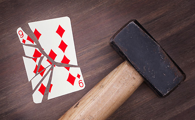 Image showing Hammer with a broken card, nine of diamond