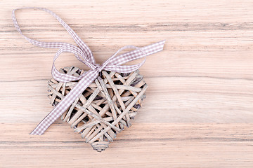 Image showing valentine's wooden hearts on a wooden background in retro color