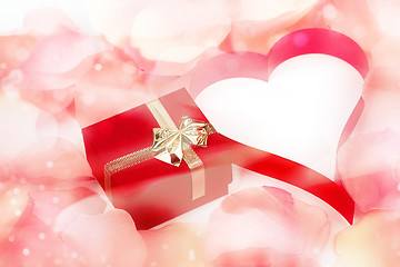 Image showing rose petals, heart and valentine present box background