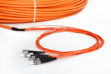 Image showing orange fiber optic ST connector patchcord