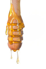 Image showing Honey dripping