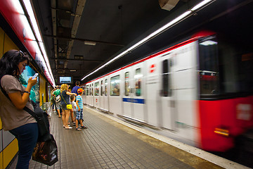 Image showing Barcelona metro station with train in motion