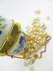 Image showing Box with pearl & gold