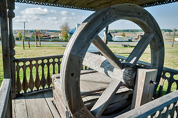 Image showing Old wooden water well in village