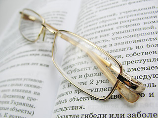 Image showing glasses & book 1