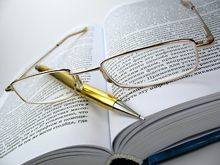 Image showing glasses & pen on book 2